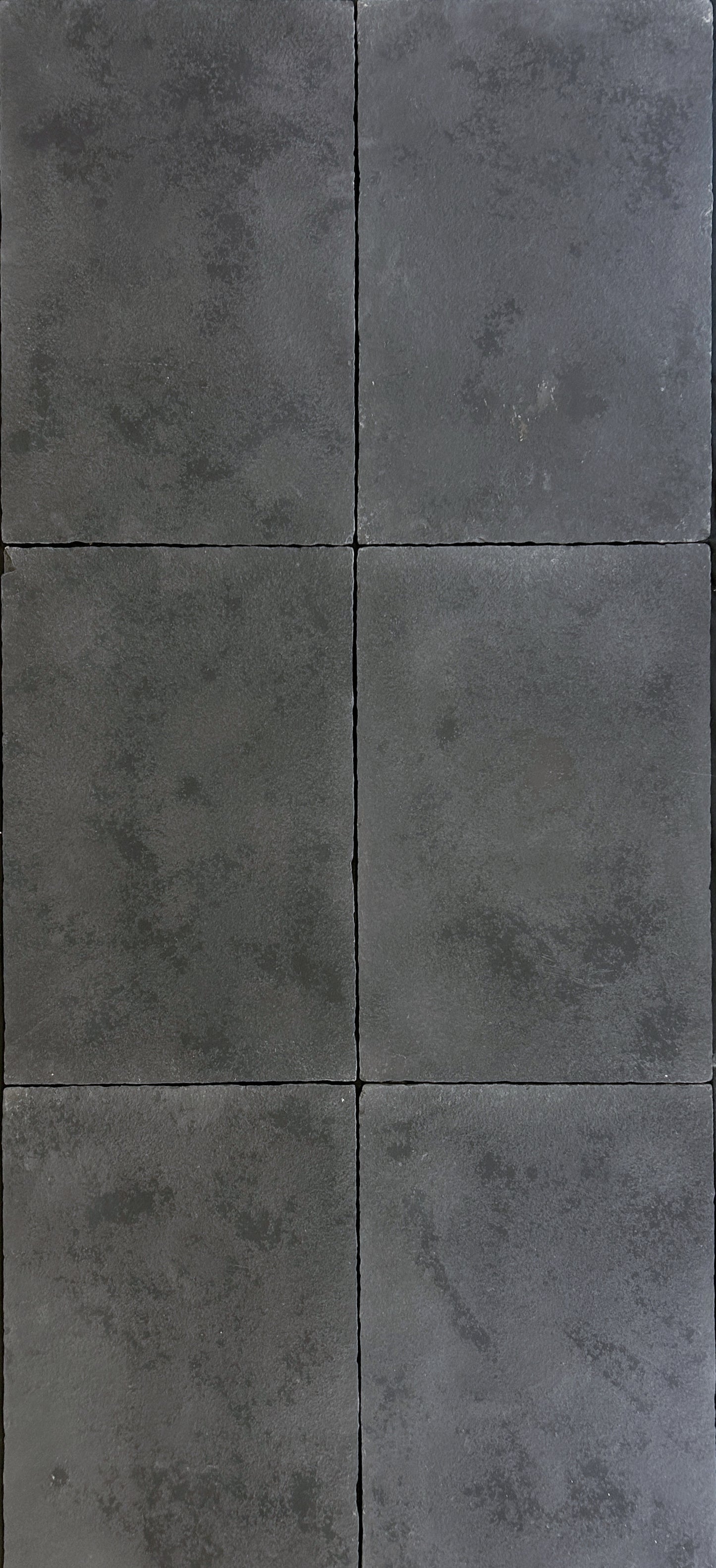 6 pieces of 21x32 black velvet limestone wtih a matte, antiqued finish.