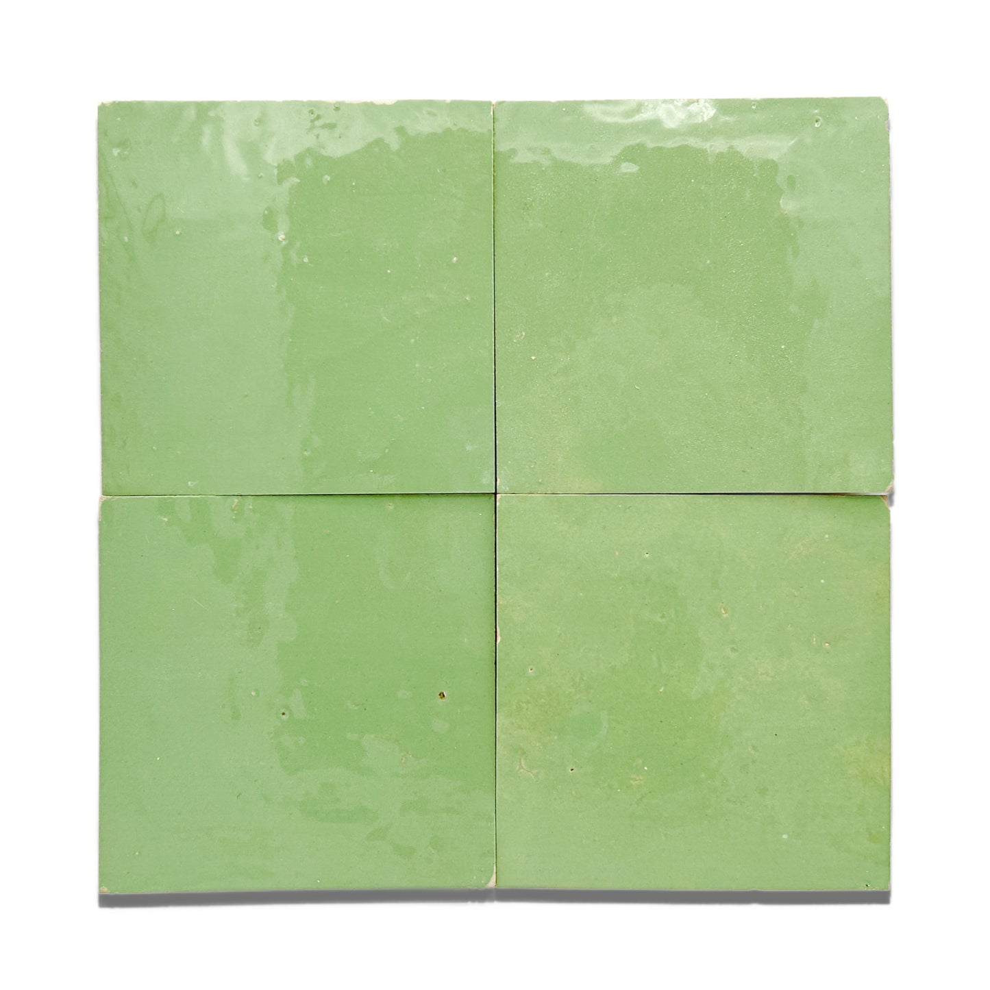 Zellige 4x4 tile in a jade green glaze.