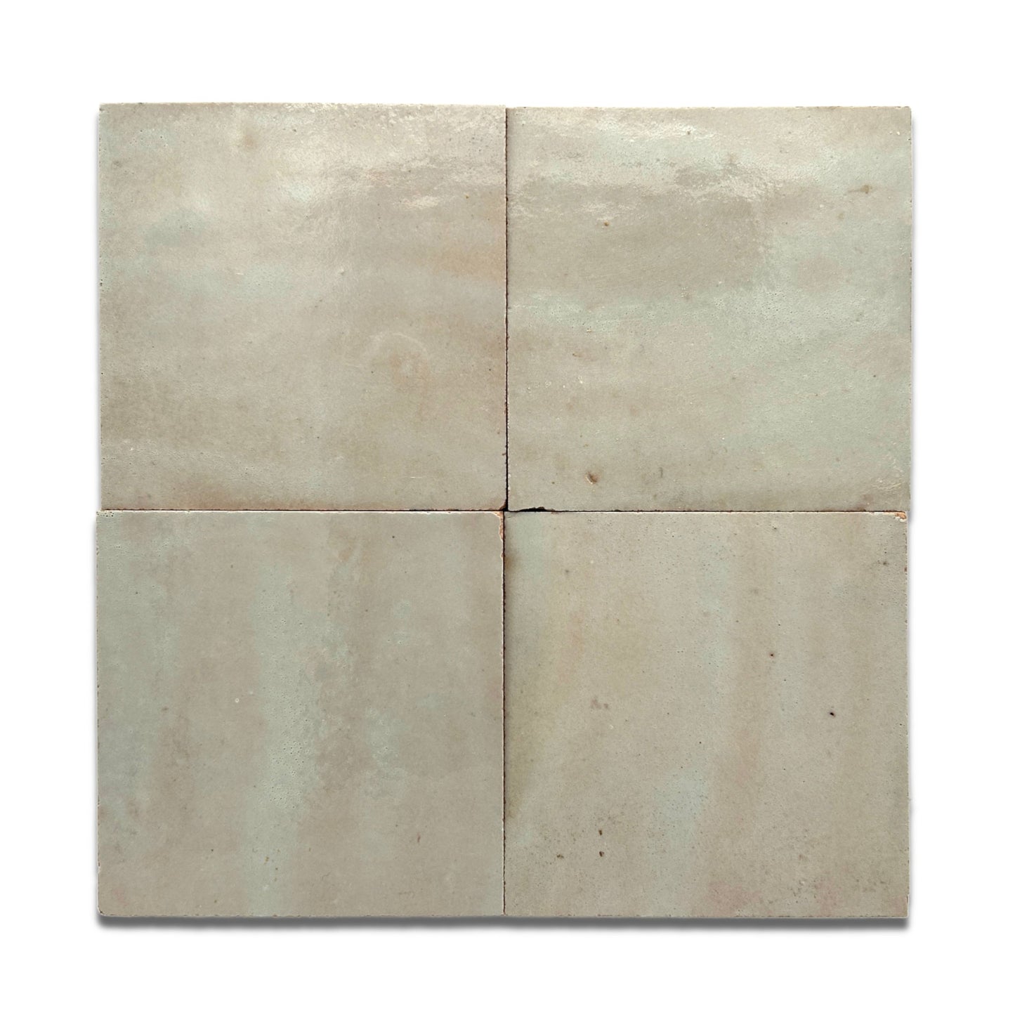 4x4 square Zellige tile with a grey and beige glossy glaze. Perfect for use on bathroom and shower walls and other interior spaces.