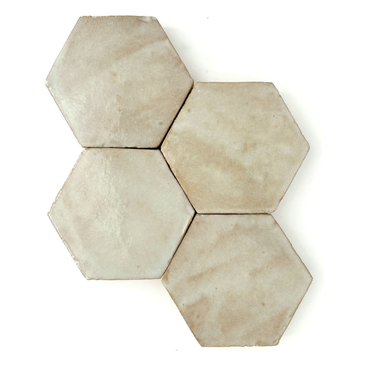 Hexagon zellige tiles in a grey beige glaze.